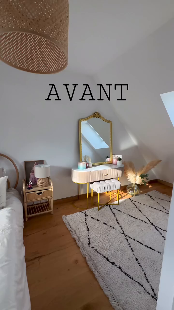 Bedroom interior with vanity, stool, rug, and bed. Text overlay reads "AVANT."