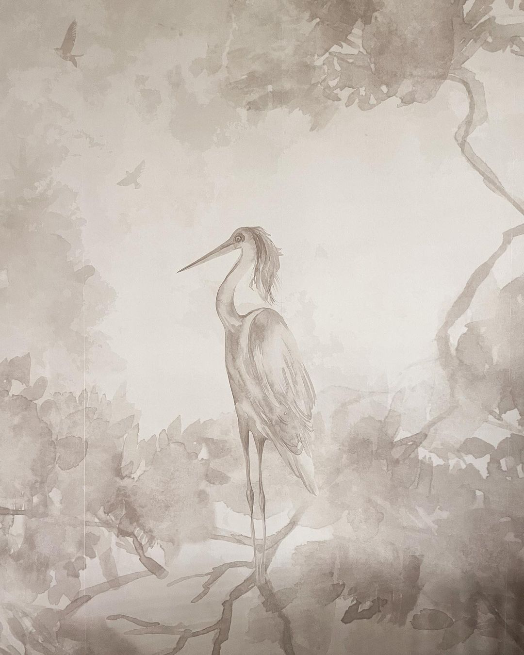 Watercolor painting of a heron standing on a branch, with trees and birds in the background.