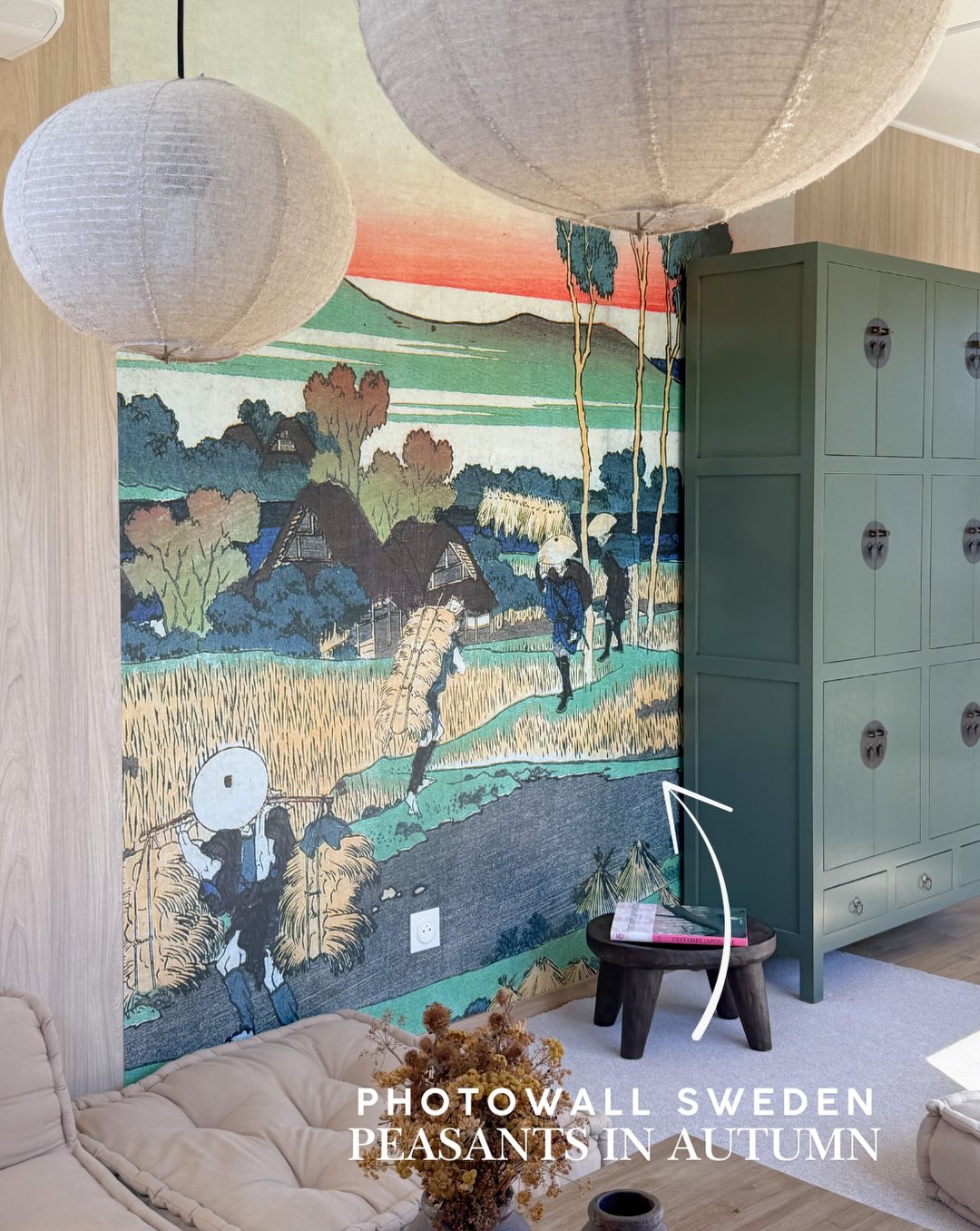 A Japanese woodblock print wallpaper depicts peasants in an autumn field.