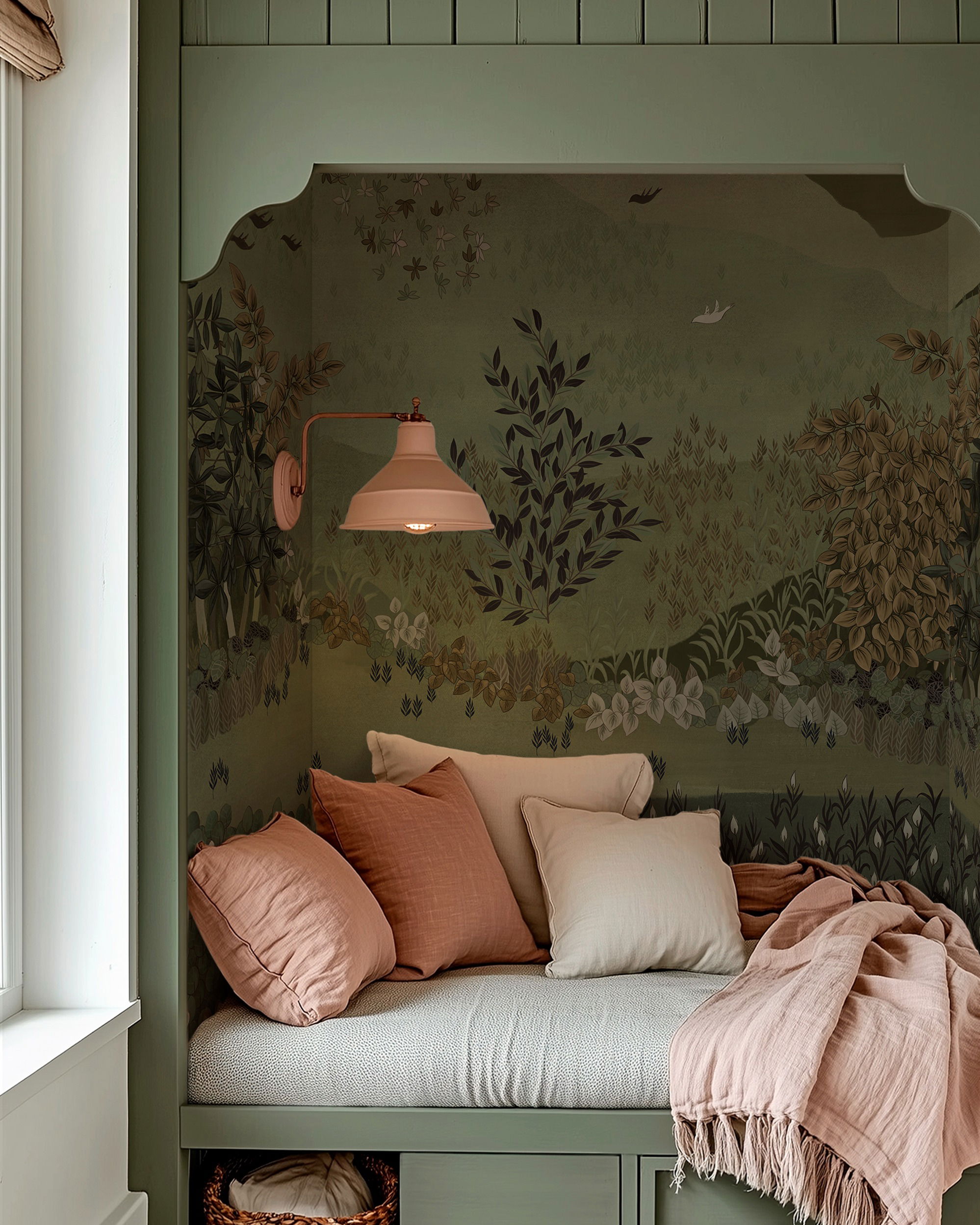 Built-in reading nook with green botanical wallpaper, pink pillows, and a pink sconce.