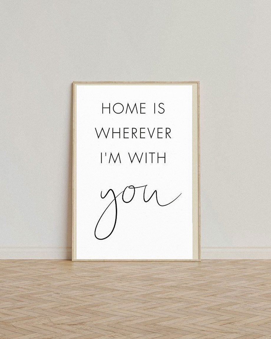 Framed print with "Home is wherever I'm with you" quote. Minimalist design.